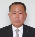正面を向いて黒いスーツを着た野田 哲郎さんのプロフィールの写真