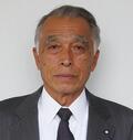 正面を向いて黒いスーツを着た田口 彰一さんのプロフィールの写真